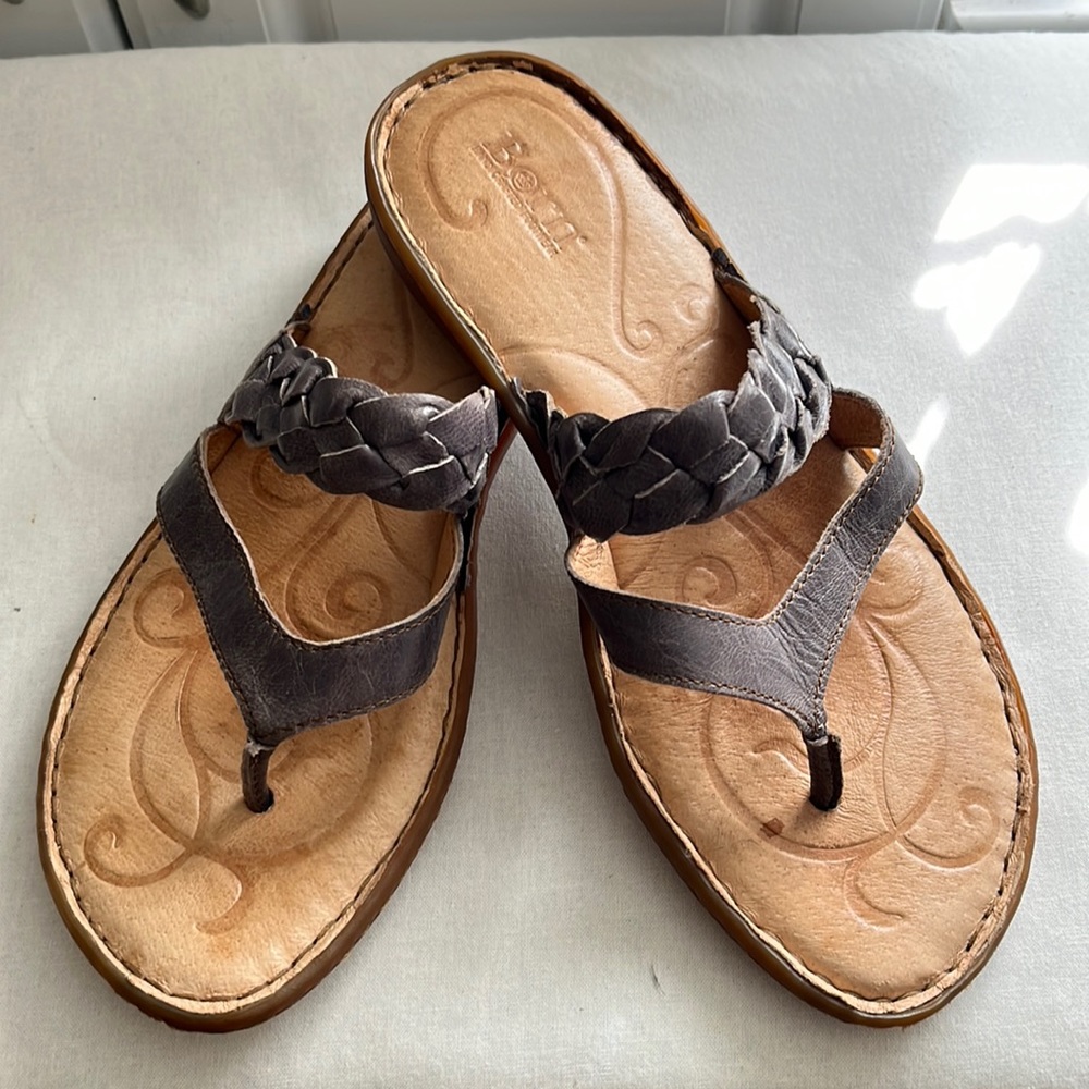 Sandals worn very few times. Color is a gray blue.
